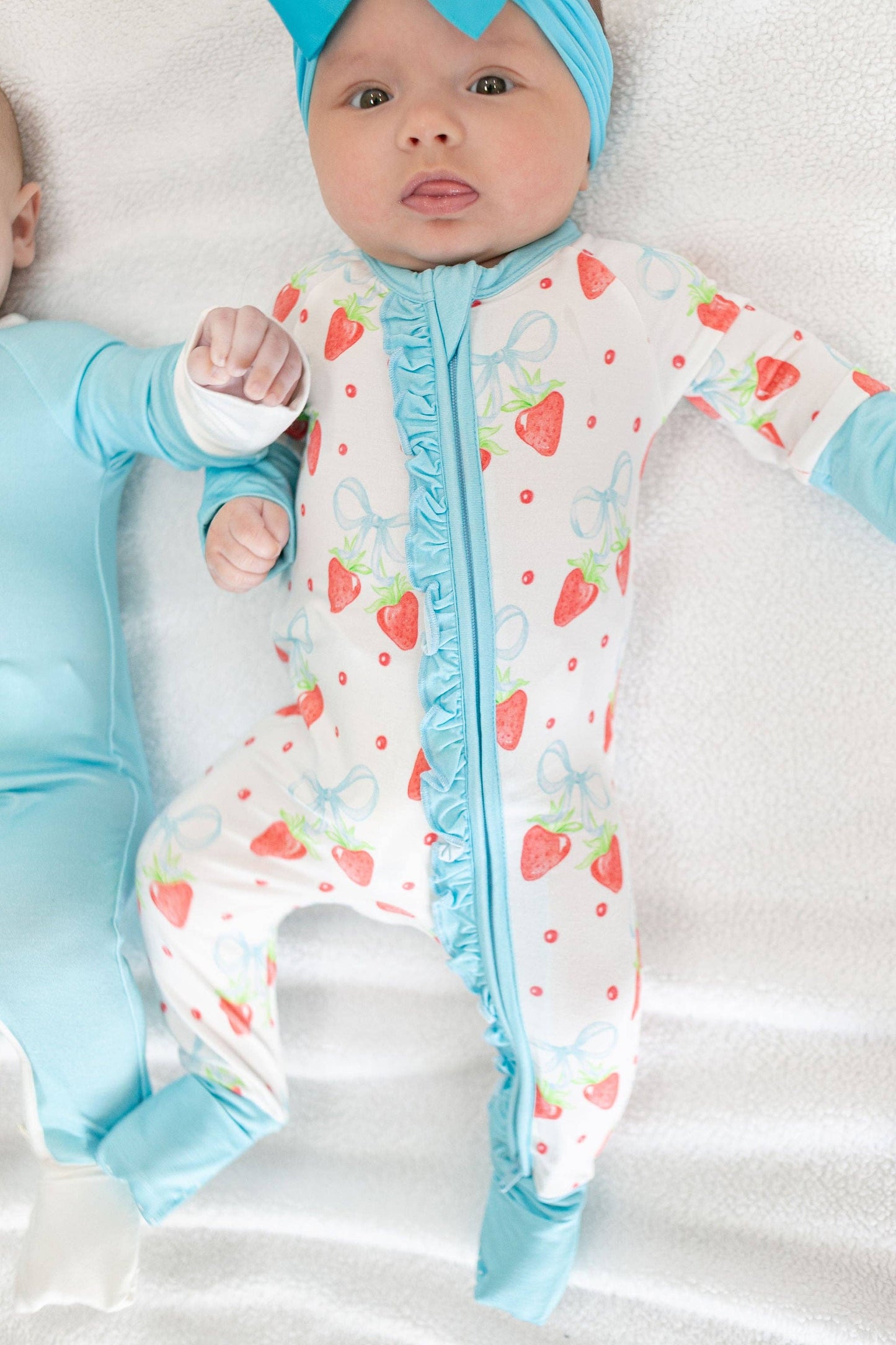 Strawberries and Bows Ruffled Zipper Onesie
