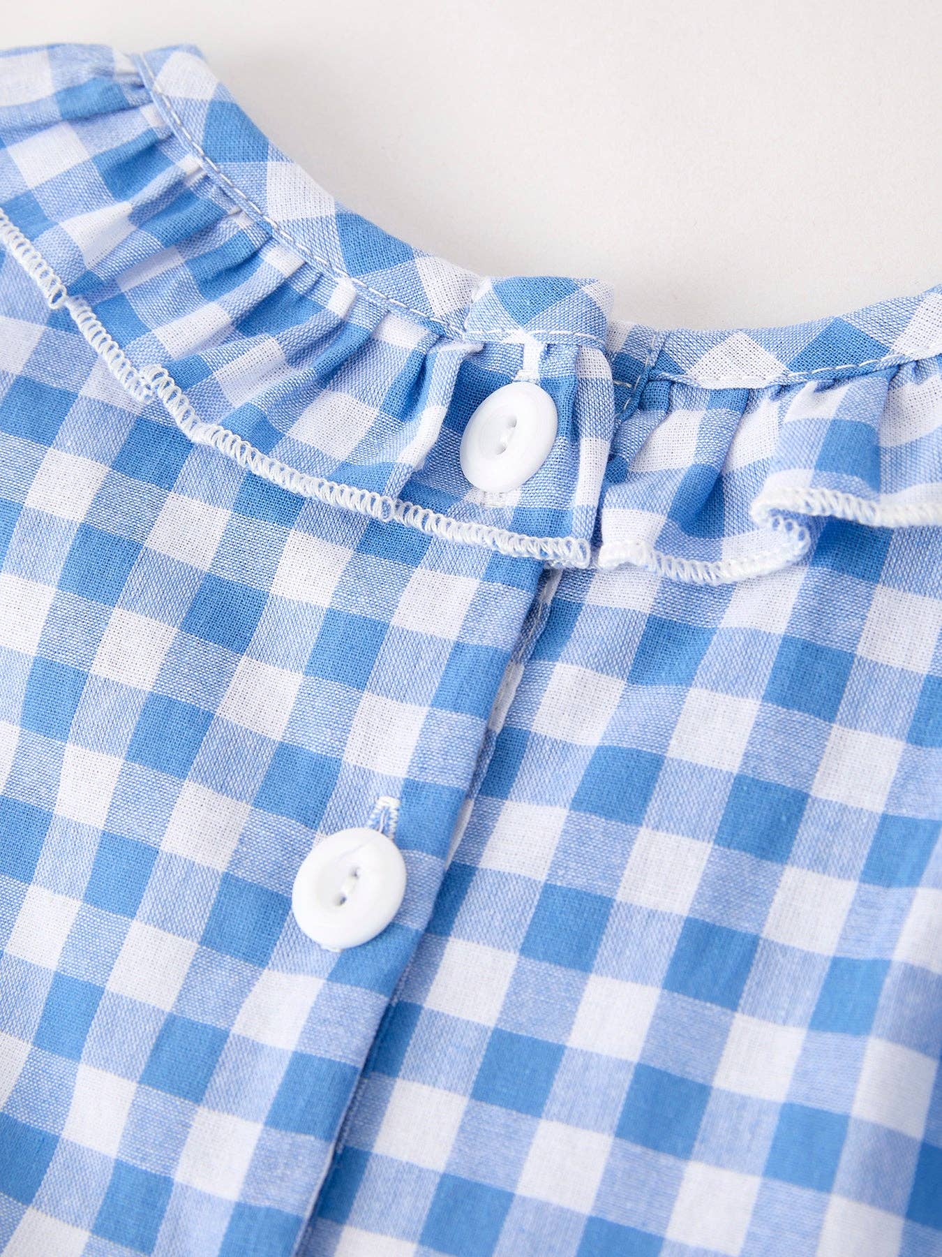 Lil’ Punkin Gingham Smocked Dress