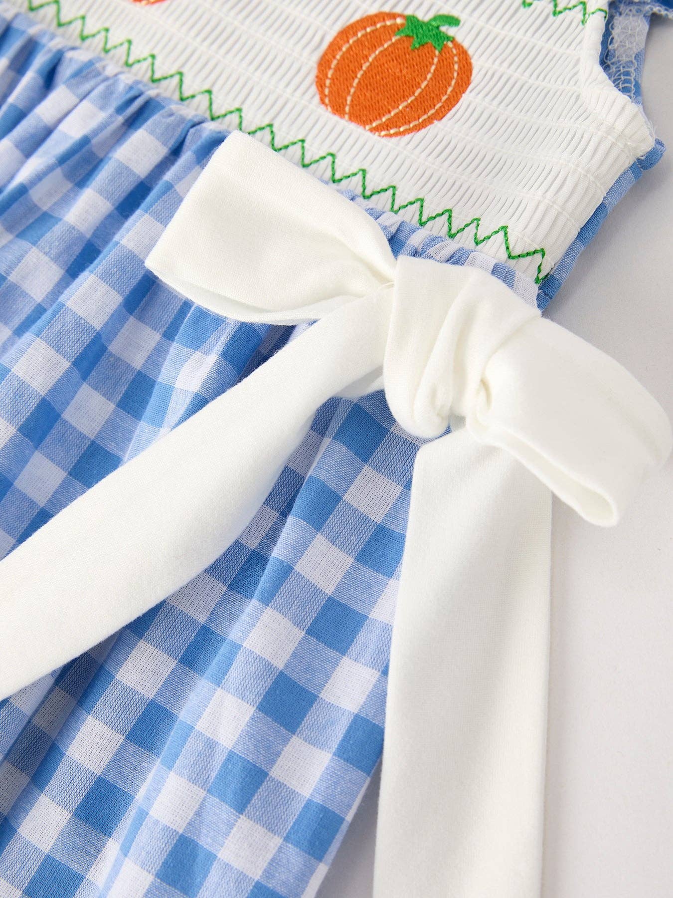 Lil’ Punkin Gingham Smocked Dress