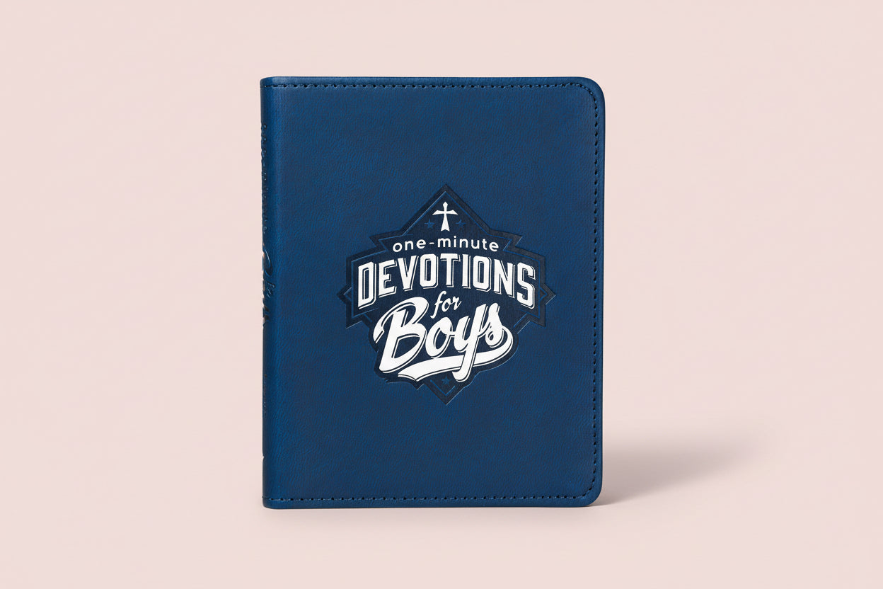 Blue notebook with 'One Minute Devotions for Boys' logo on a beige background