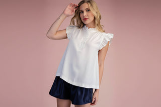 White Sleeveless Ruffle Neck Blouse