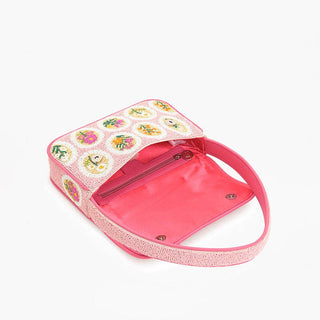 Pink children's backpack with floral pattern on a white background