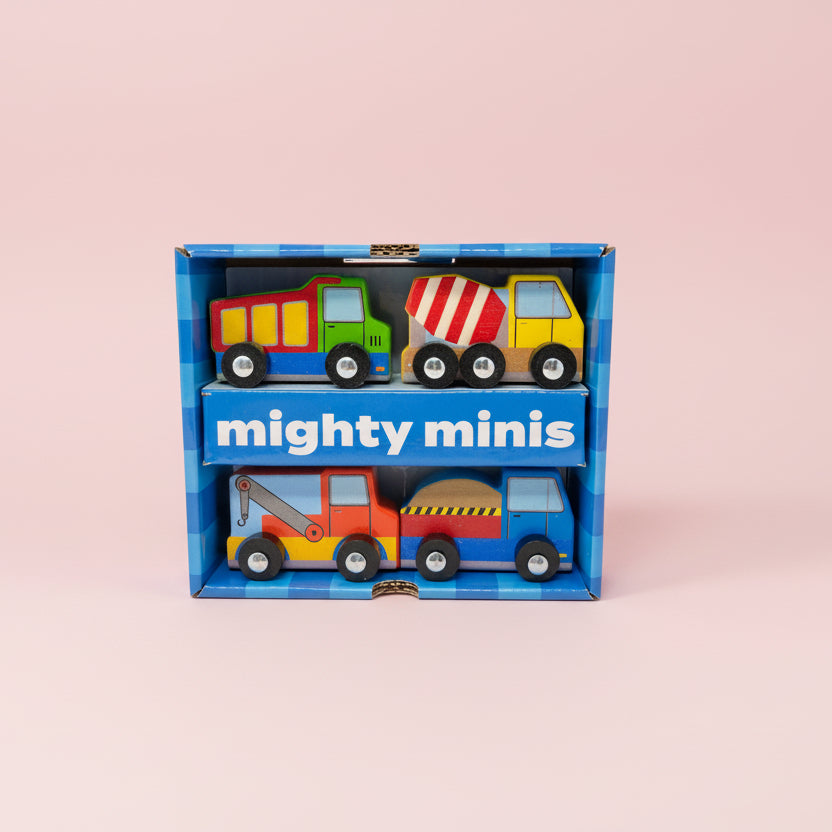 Box of 'mighty minis' toy trucks on a pink background