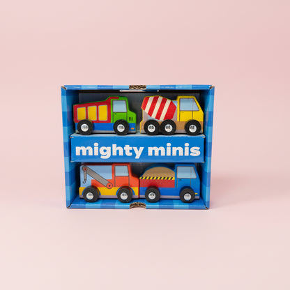Box of 'mighty minis' toy trucks on a pink background