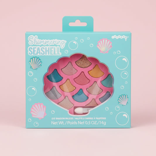 Shimmery Seashell makeup palette packaging on a light blue background with shell and bubble designs.