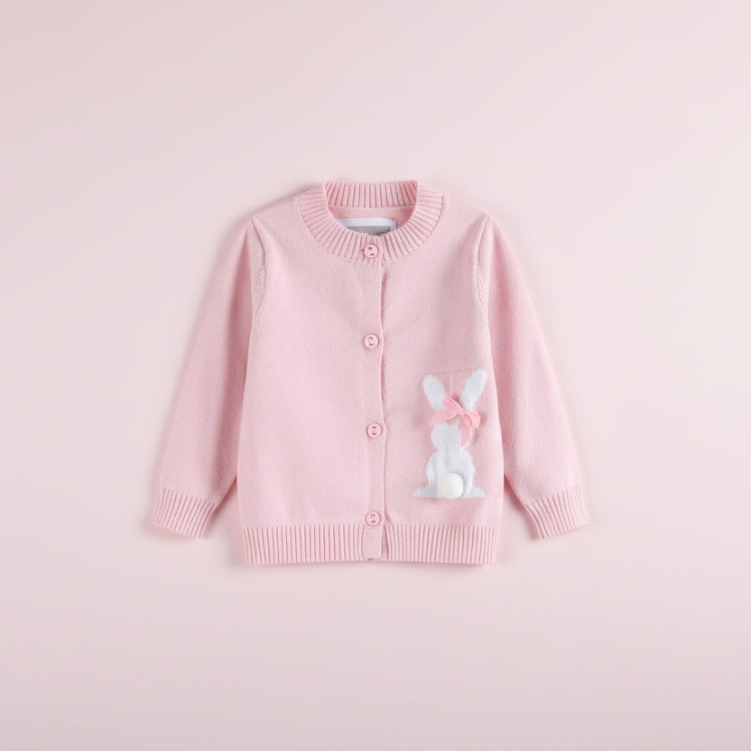 Pink cardigan with a bunny design on a pink background