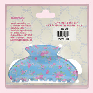Floral hair clip on a pink and white patterned card with IScream branding.