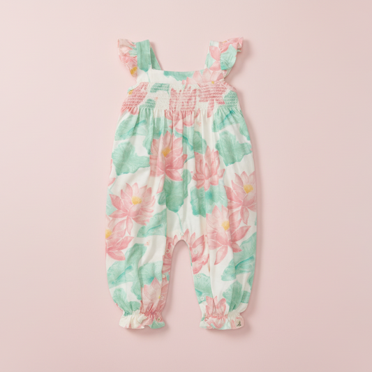 Floral print baby romper on a white background