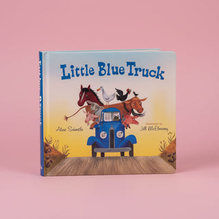 Children's book titled 'Little Blue Truck' on a pink background